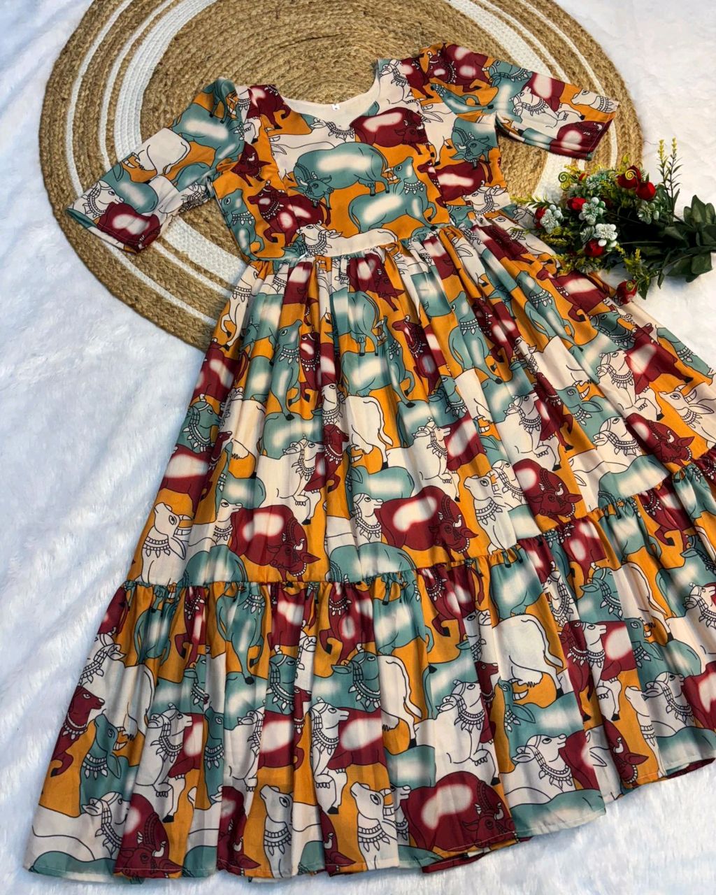 This beautiful kalamkari printed maxi gown made with soft cotton fabric and feeding zip also attached