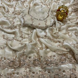 Launch Grand party wear saree in original gold beeds work